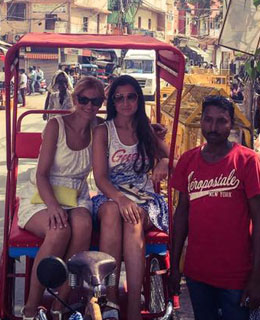 Travel Astu guests Elisabet and Maria from Spain in Delhi enjoying Rickshaw ride