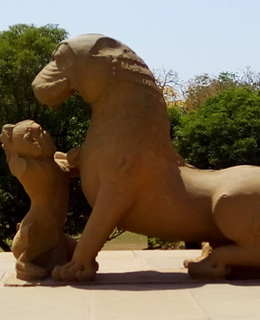 Baby lion playing with Mother, Khajuraho Temple