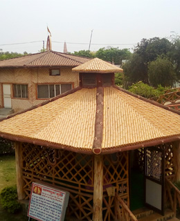 Beautiful meditation huts at Ananddham Ashram Delhi